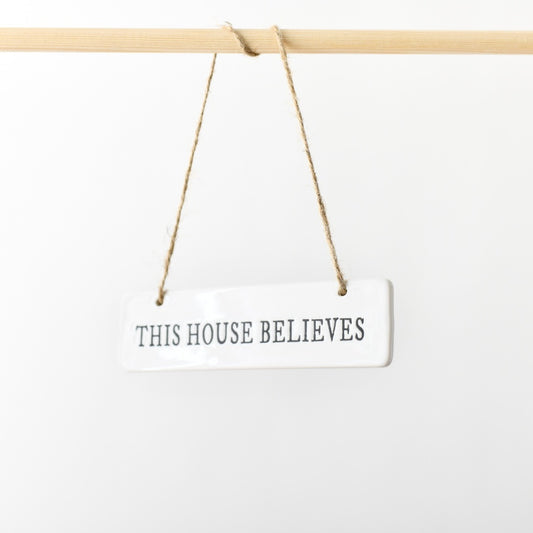 This House Believes Ceramic Hanging Sign